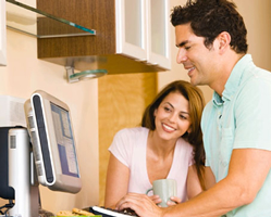 Man and Woman using online banking.